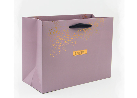 Sacs en papier de estampillage chauds personnalisés de boutique d'or avec les poignées noires de ruban